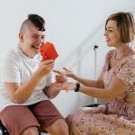 Boy with Cerebral Palsy in Physiotherapy with a Therapist